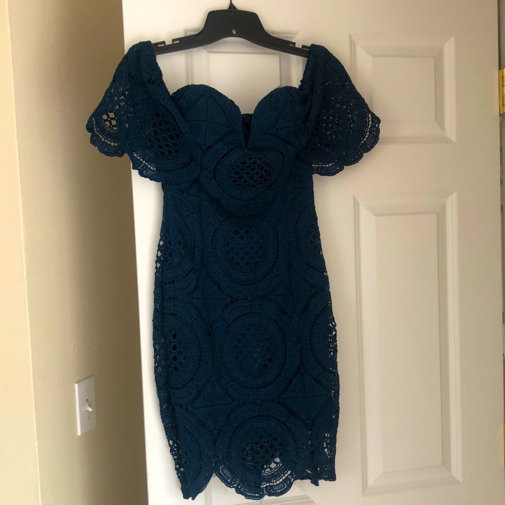 Teal green midi off the shoulder dress.